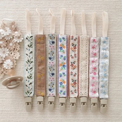 Attache tétine esthetique