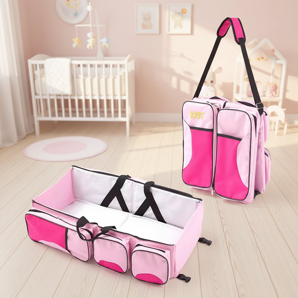 Sac a langer rose convertible en lit nomade, un couchage d'appoint compact pour les balades et voyages en famille.