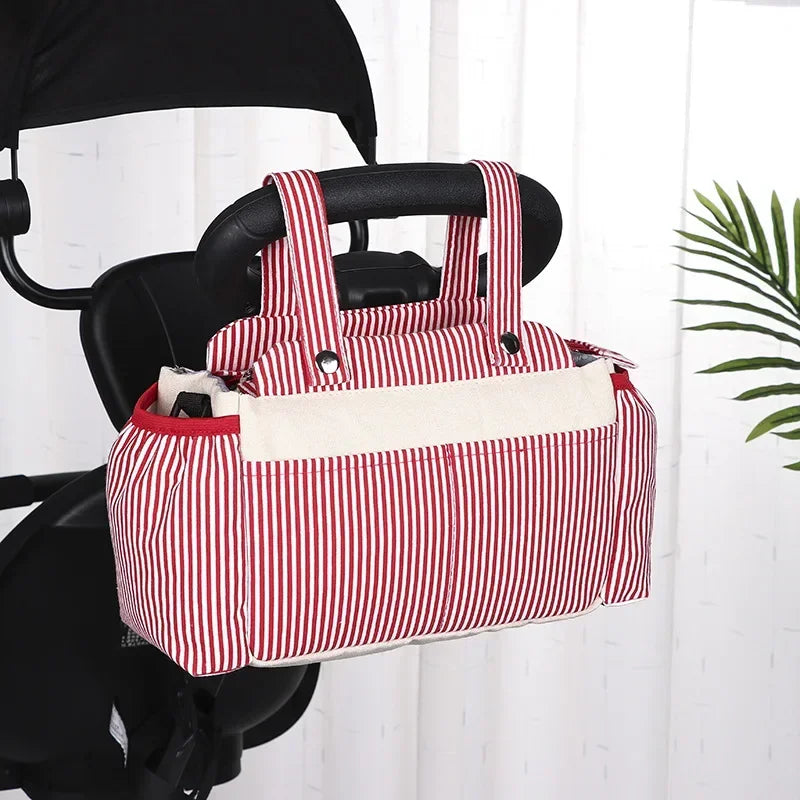 sac-a-langer-poussette-essentiel-rouge-raye-visible-sur-les-images