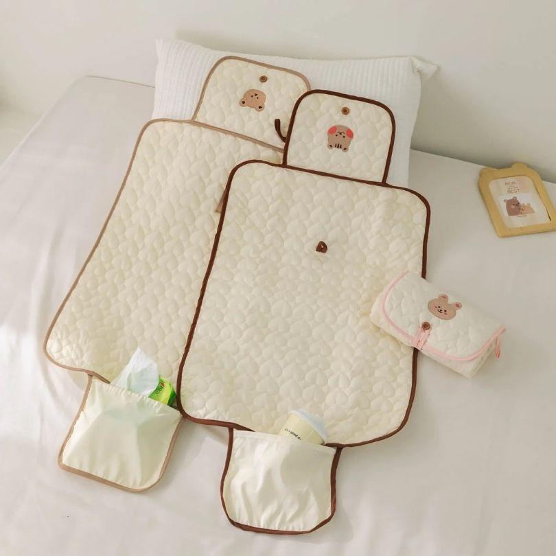 tapis-a-langer-nomade-protection-lit
