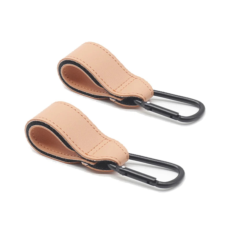 Paire d'attaches beige nude s'harmonisant avec un univers de puericulture aux teintes naturelles.