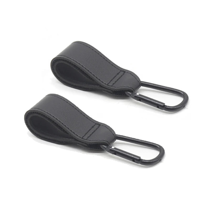Paire d'attaches poussette noires passe-partout adaptees a tous les modeles de poussette.