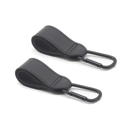 Paire d'attaches poussette noires passe-partout adaptees a tous les modeles de poussette.