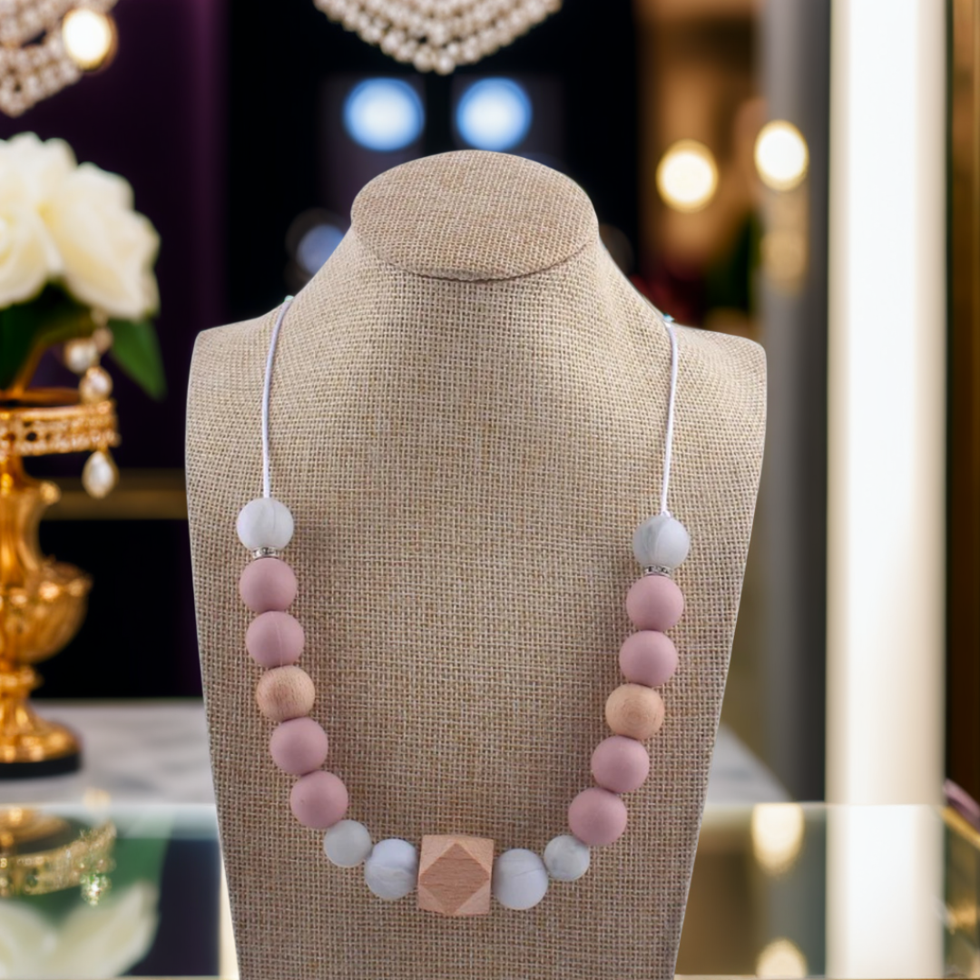 collier-de-portage-original-et-pratique-rose