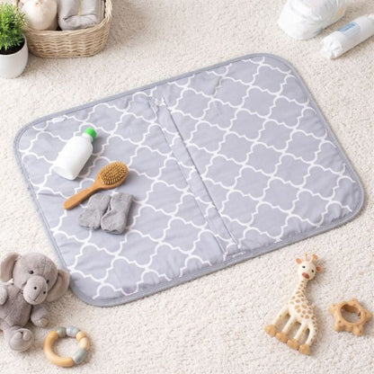 comment-choisir-un-tapis-a-langer-nomade