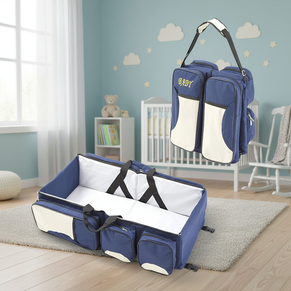 Lit sac a langer de voyage en bleu marine, presente en position sac et en position lit deplie pour bebe.