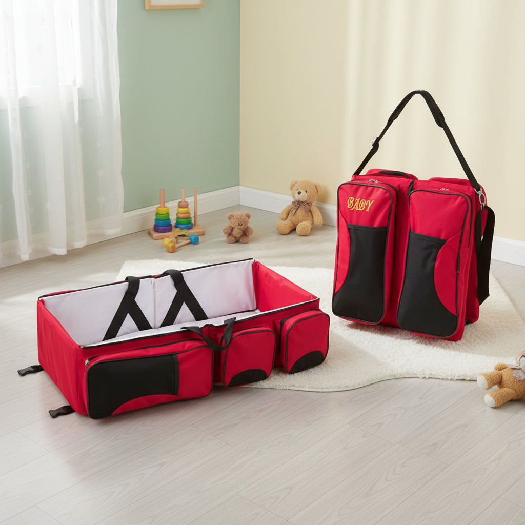 Lit sac a langer rouge et noir vu ferme en bandouliere et ouvert en couchage portable pour nouveau-ne.