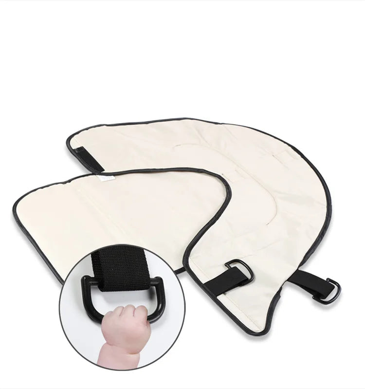 Anneau interieur que bebe peut agripper pour occuper ses mains et rester tranquille durant le change.
