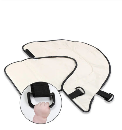 Anneau interieur que bebe peut agripper pour occuper ses mains et rester tranquille durant le change.