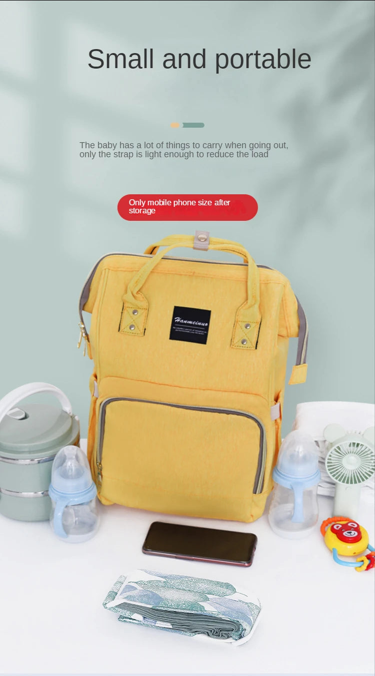 Porte bebe ultra compact qui se range a la taille d'un telephone, pour alleger le sac lors des sorties avec bebe