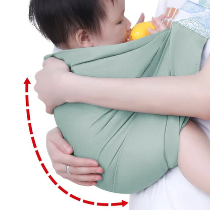 Maintien ergonomique enveloppant qui soutient tout le corps de bebe pour un portage sur pour la hanche