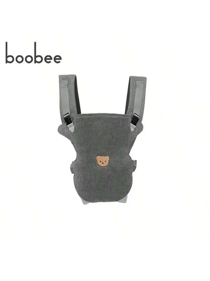 Porte-bebe physiologique gris chine presente seul, ideal pour visualiser le tissu doux et le design epure de la boutique.