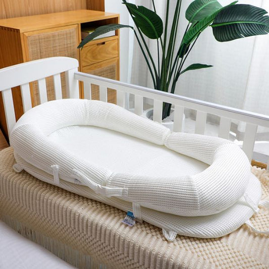 reducteur-de-lit-bebe-inclinable
