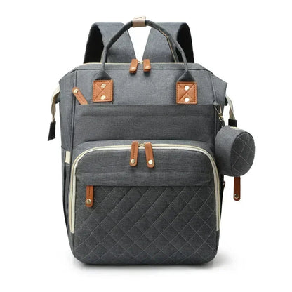 Sac a dos a langer avec lit en gris anthracite, dos aere et bretelles rembourrees pour un portage confortable toute la journee.