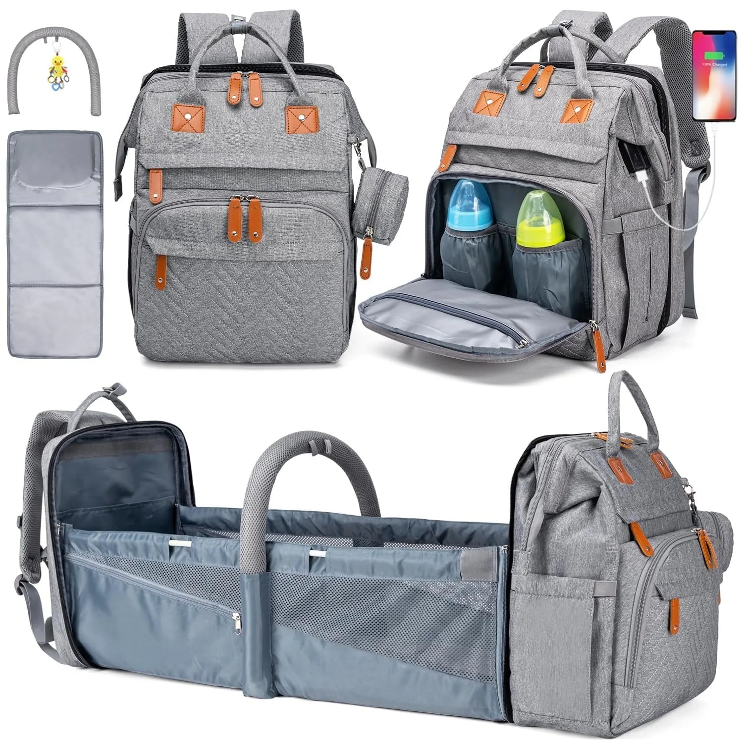 Sac a dos a langer gris avec lit bebe pliable integre, port USB et accessoires inclus pour les parents nomades.