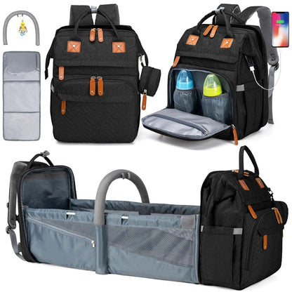 Sac a dos a langer noir elegant avec lit bebe pliable, port USB et matelas a langer inclus pour toutes les situations.