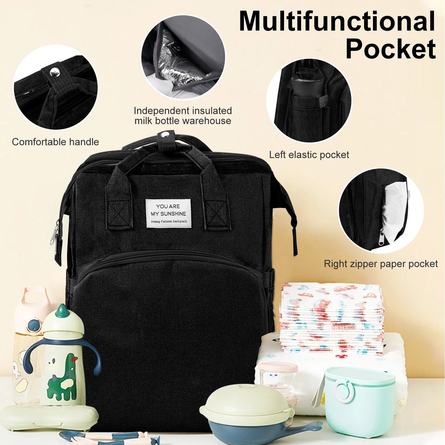 Details des poches multifonctions dont le compartiment isotherme pour biberon et la poche a lingettes pour tout garder a portee de main.