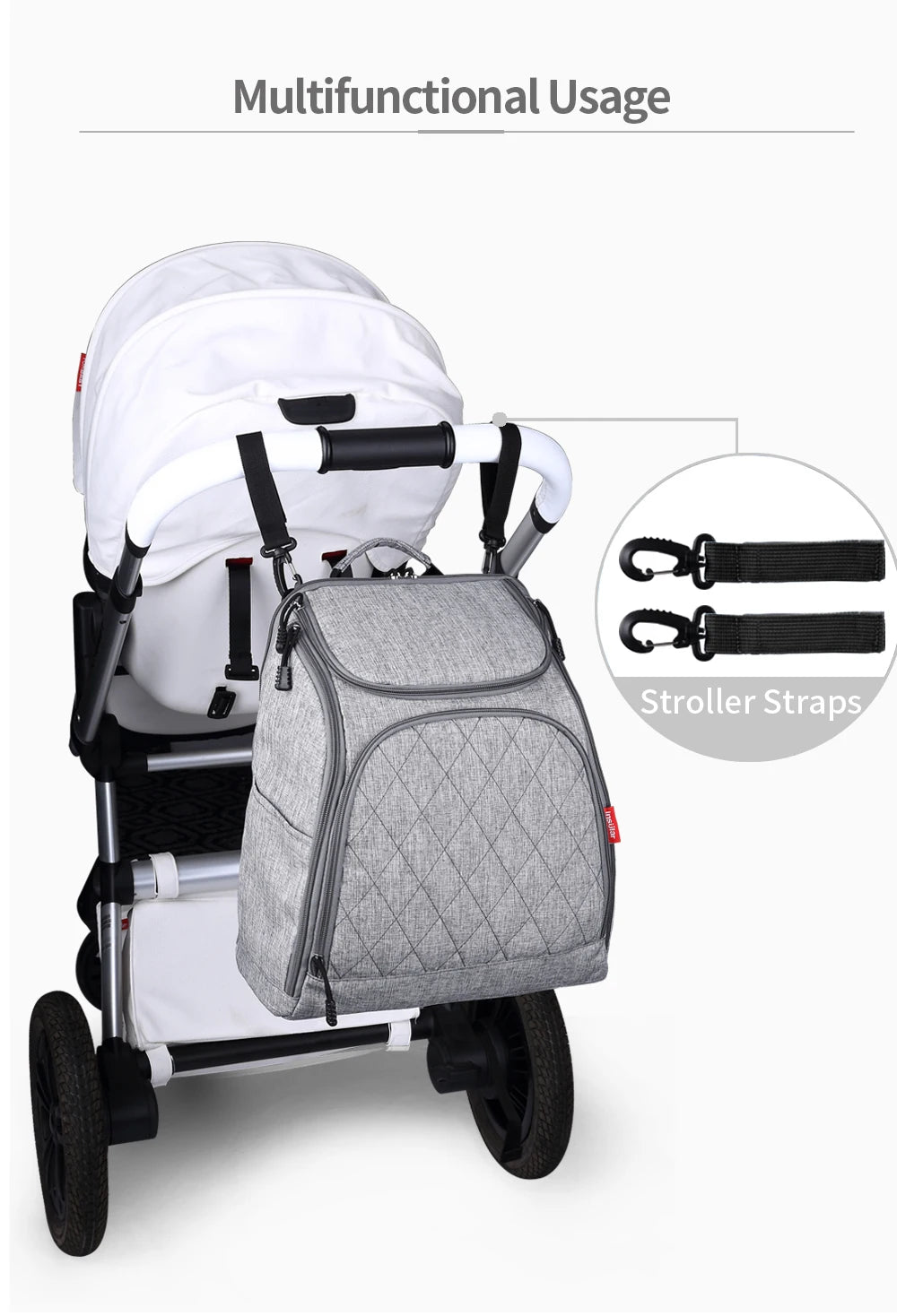 Sac suspendu a la poussette avec ses crochets fournis, liberant les mains des parents pendant la balade.