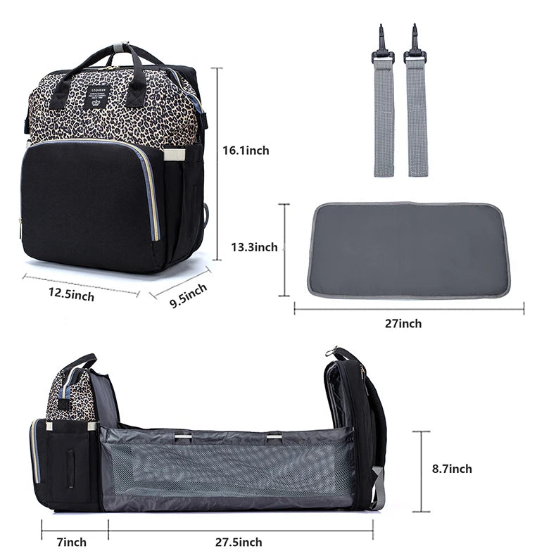 Sac a langer noir avec ses cotes precises, son matelas et ses sangles pour visualiser le lit une fois entierement deplie.