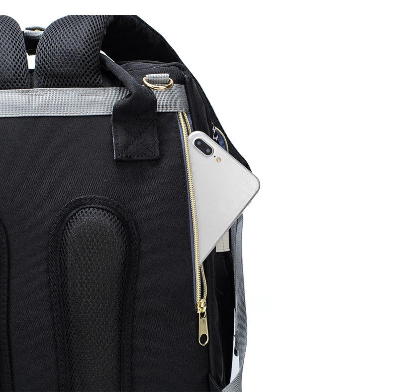 Poche zippee dissimulee dans le dos du sac pour garder telephone et objets de valeur en securite pendant les deplacements.