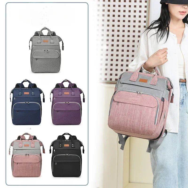 Nuancier des cinq coloris du sac a langer convertible : gris, bleu, violet, rose et noir pour tous les gouts.