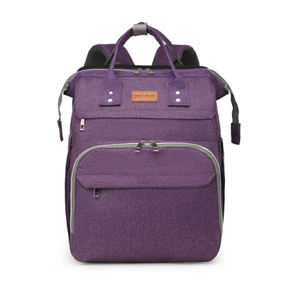 Sac a langer convertible en coloris violet, sobre et chic, adapte aux sorties quotidiennes avec un nourrisson.