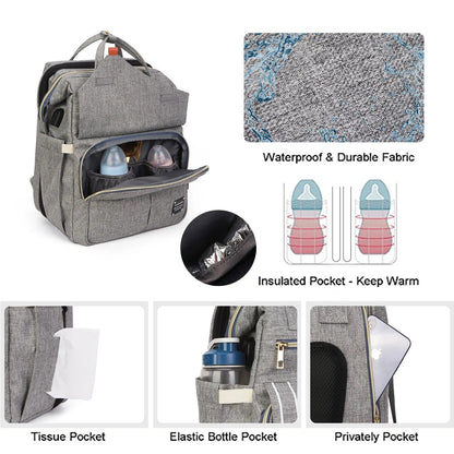 Details des rangements du sac a langer : poche isotherme pour garder les biberons au chaud, tissu impermeable et poches laterales pratiques.
