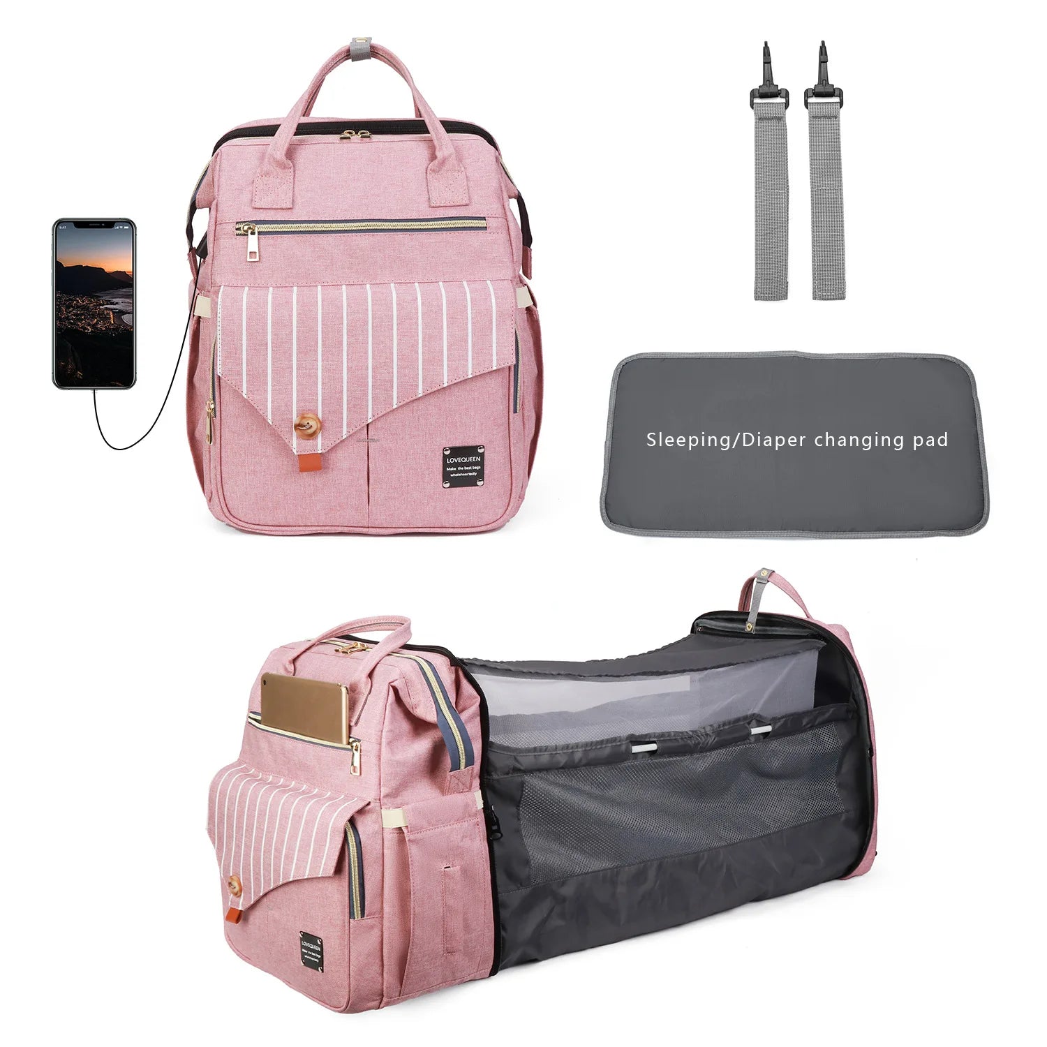 Sac a langer rose transforme en lit bebe pliable avec matelas a langer, port de charge USB et sangles pour tout emporter facilement.