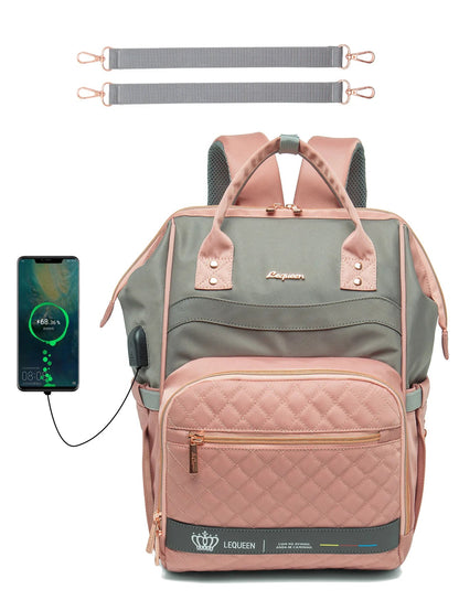 Sac a langer rose avec port USB permettant de recharger son telephone en deplacement, avec sangles de fixation fournies.