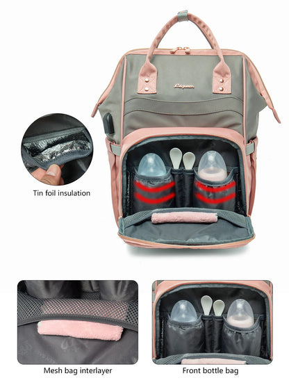 Poche isotherme en aluminium du sac a langer rose gardant les biberons au chaud, avec compartiments dedies et poche frontale filet.