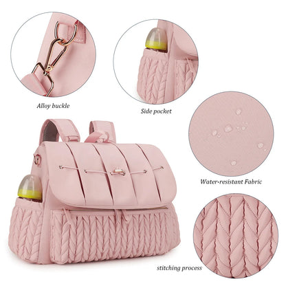 Details du sac a langer avec boucle en alliage, poche laterale pour biberon et tissu impermeable protegeant les affaires de bebe
