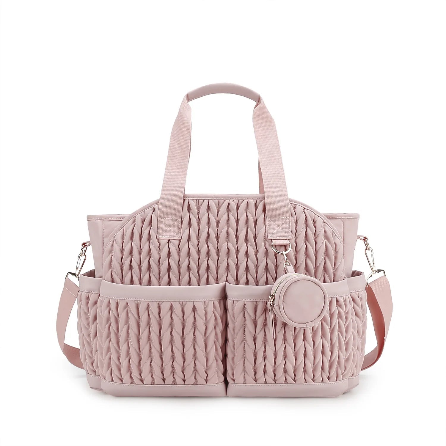 Sac a langer rose au design matelasse elegant avec anses et bandouliere, ideal pour les jeunes mamans
