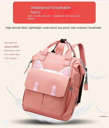 Sac a langer rose en tissu impermeable et respirant pesant seulement 0,46 kg pour un portage sans fatigue