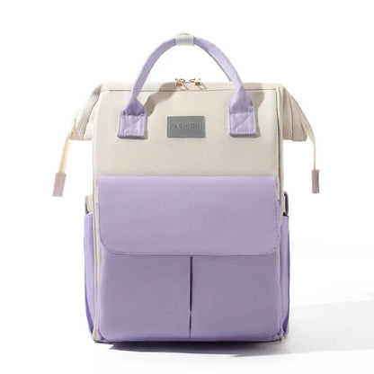 Sac a dos a langer bicolore blanc et mauve, une touche coloree pour un accessoire de puericulture tendance.