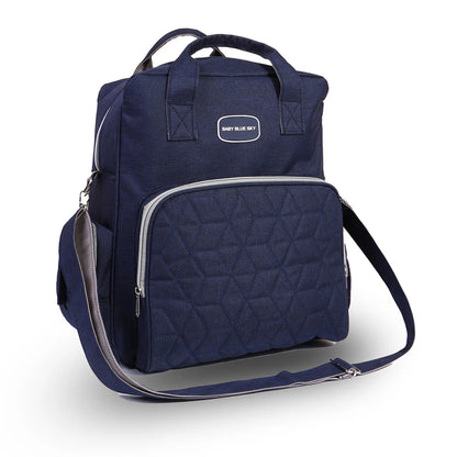 Sac a langer bleu marine avec bandouliere ajustable, un accessoire elegant qui se porte en sac a dos ou en bandouliere.