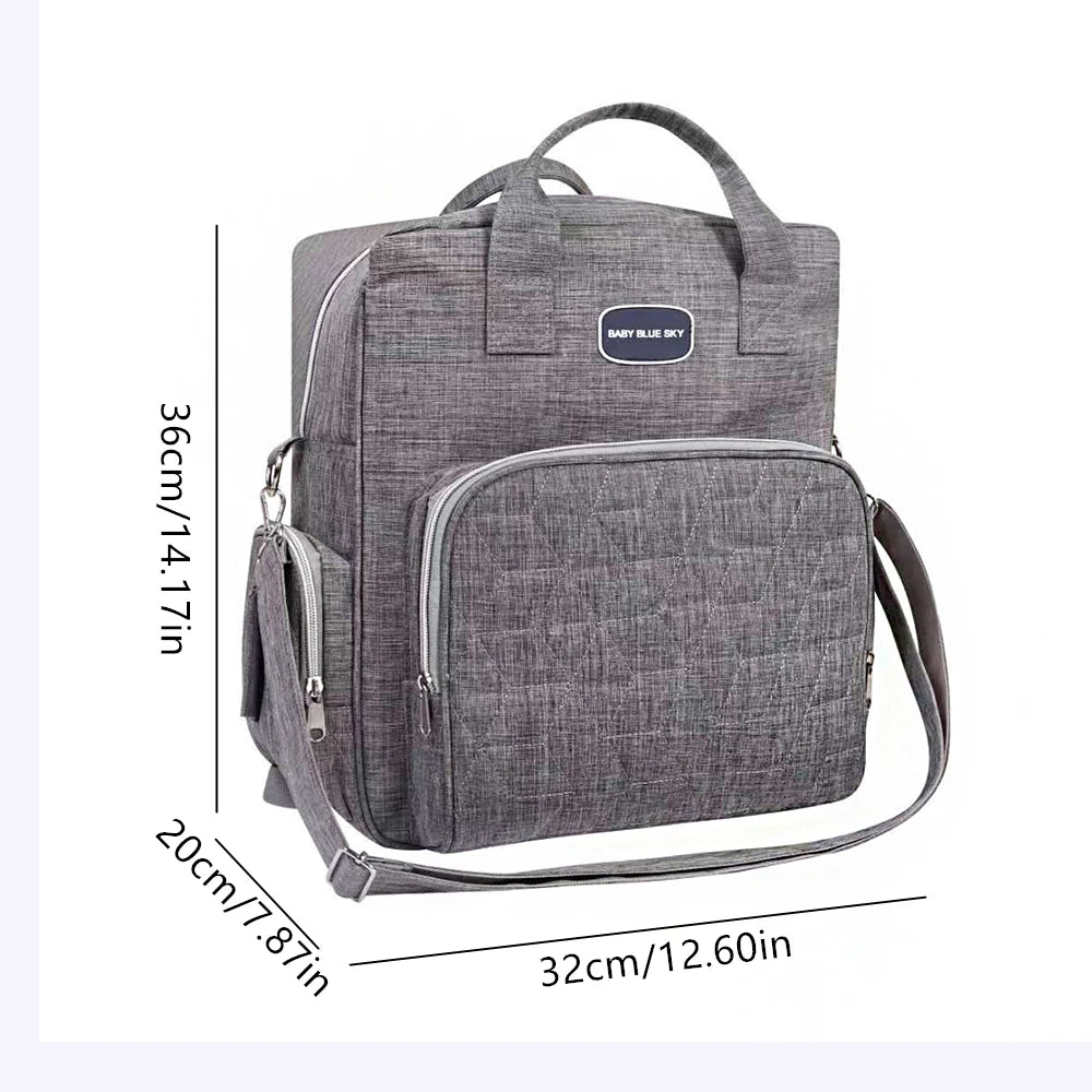 Schema des dimensions du sac a langer, 36 cm de haut sur 32 cm de large, pour visualiser sa capacite de rangement.