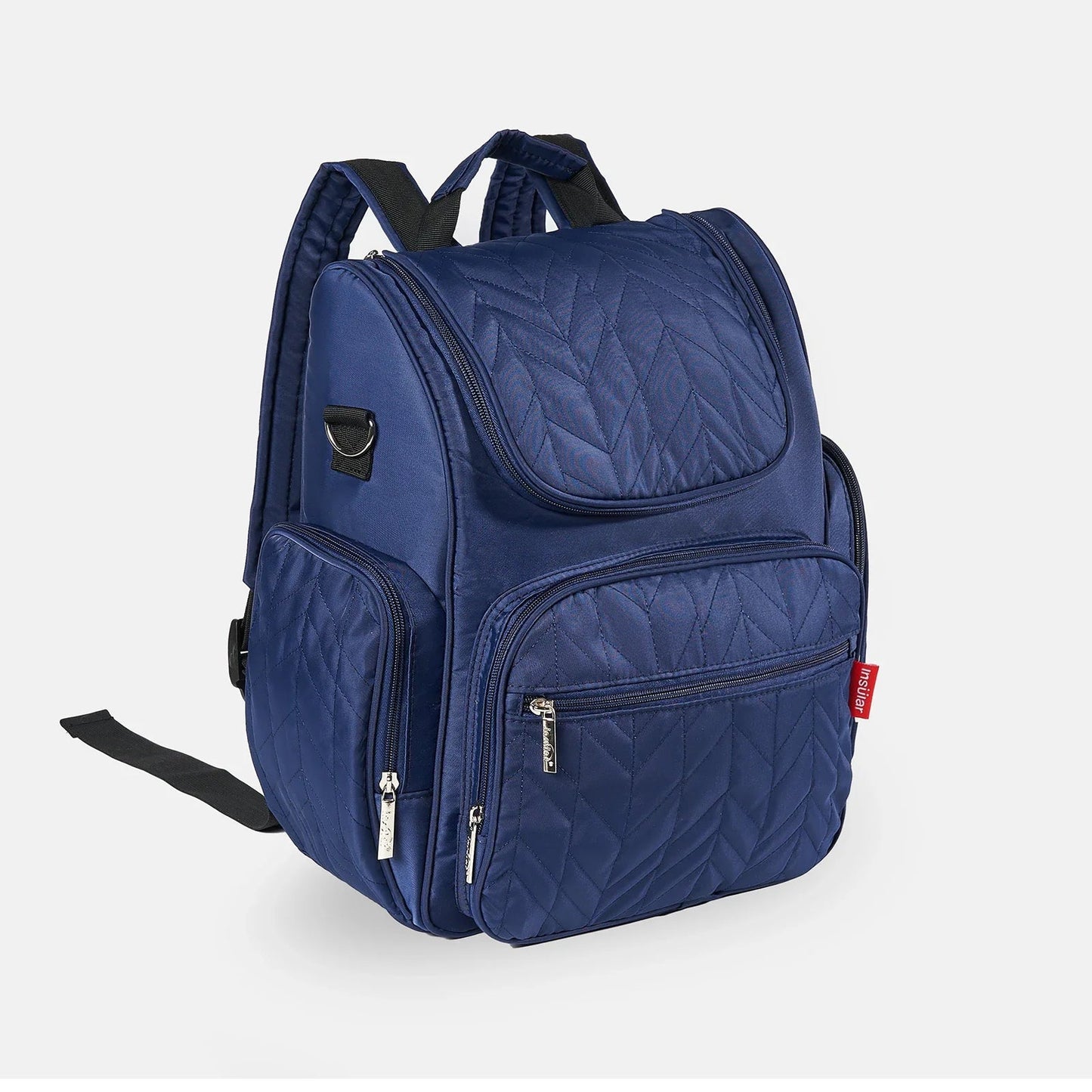 Sac a langer sac a dos bleu marine matelasse, un coloris sobre qui convient aux deux parents.