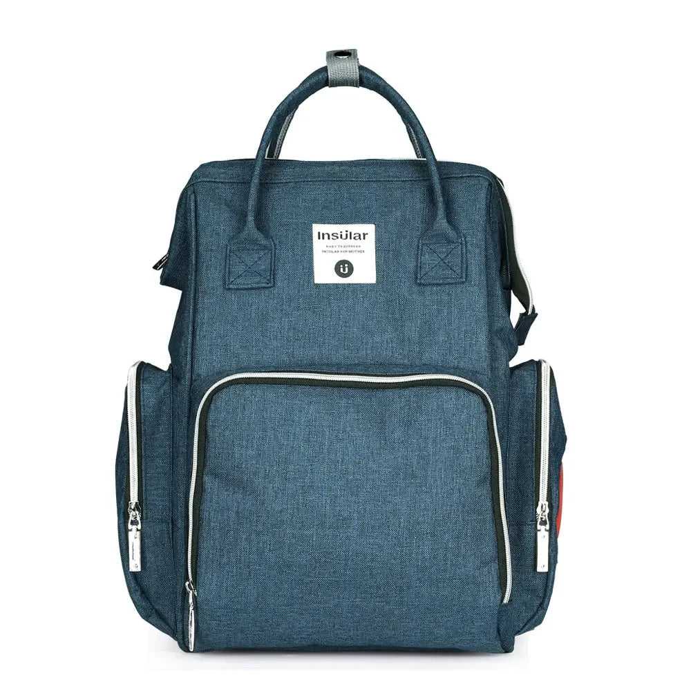 Version bleu denim du sac a langer, teinte discrete qui s'accorde facilement avec toutes les tenues.