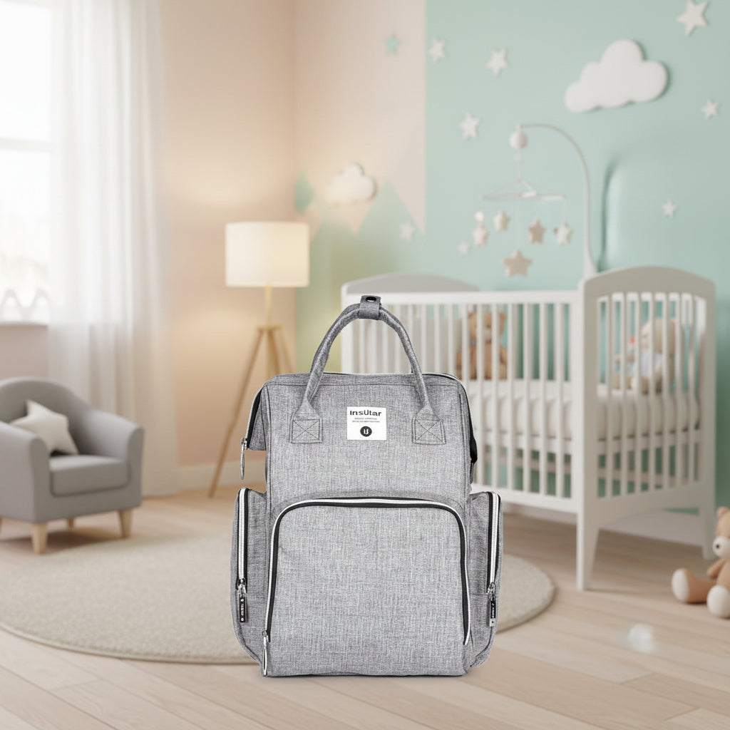 Sac a langer a dos gris chine sobre et polyvalent, adapte aussi bien aux papas qu'aux mamans.