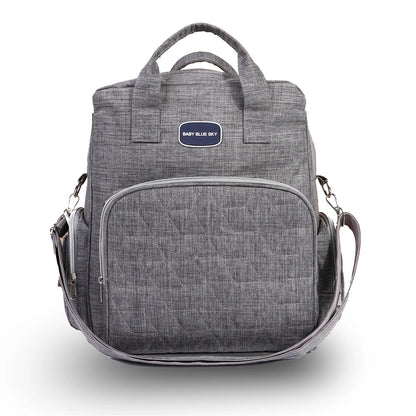 Sac a langer sac a dos gris chine au design matelasse epure, ideal pour les parents modernes en deplacement.