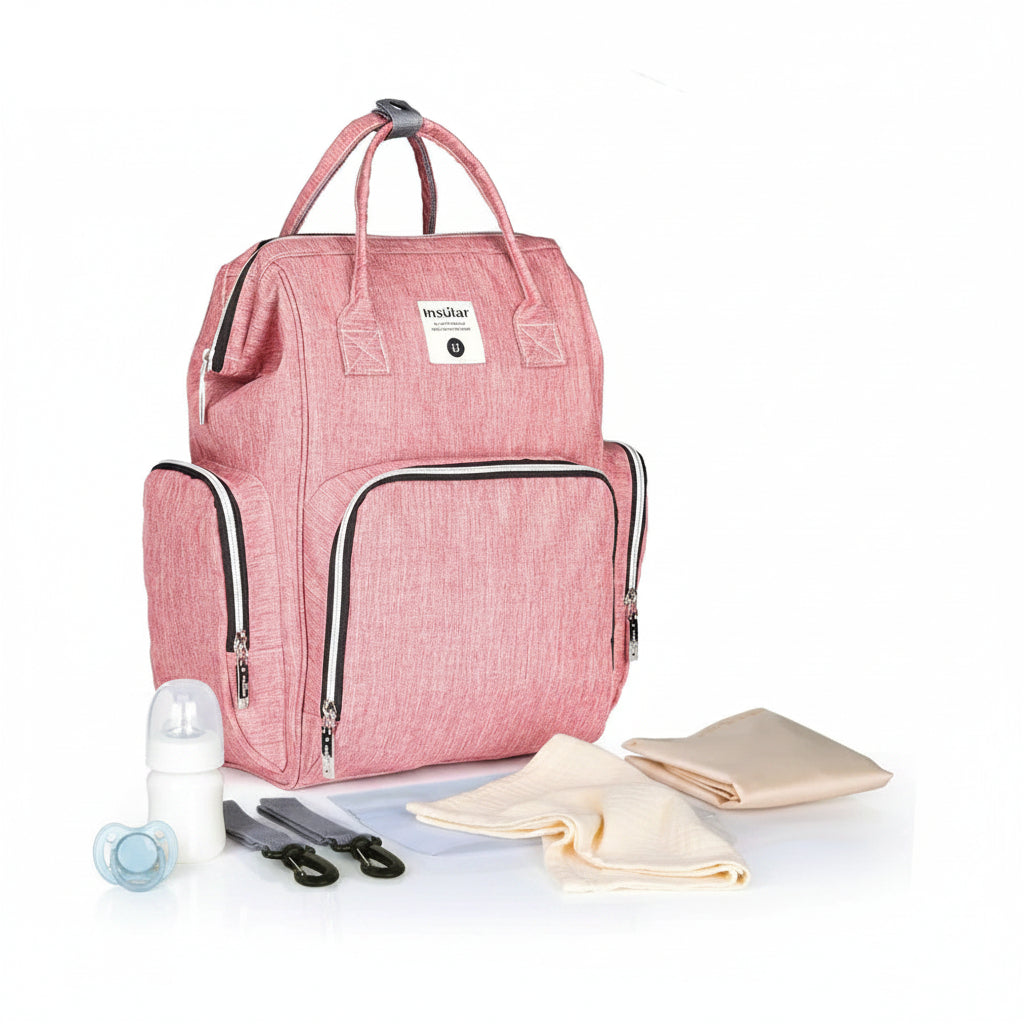 Sac a langer a dos rose Insular livre avec matelas a langer, sangles poussette et pochette etanche pour tout organiser.
