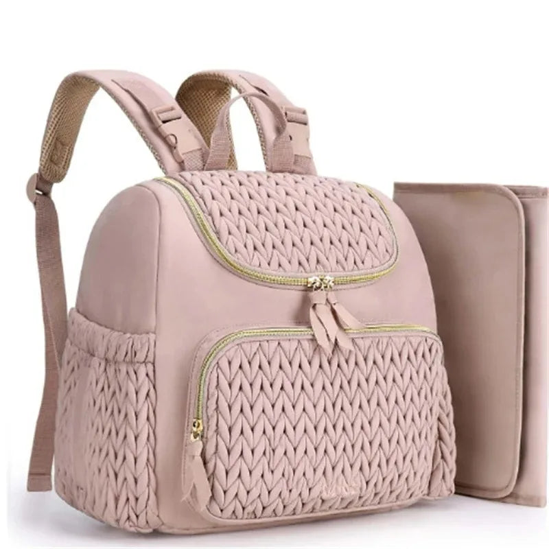 sac de voyage bebe rose et son tapis