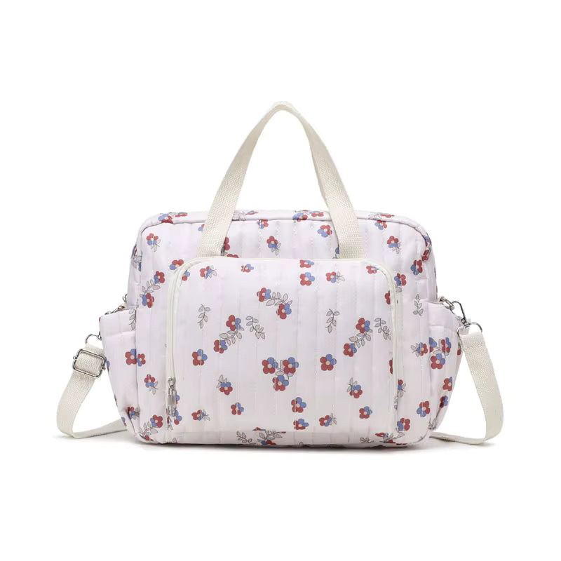 sac-voyage-bebe-motif-fleuri