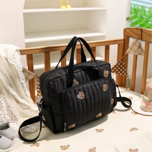 sac-voyage-bebe-noir-nounours