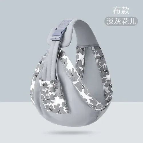 Sling de portage coloris gris fleuri presente seul, pret a accueillir bebe des la naissance.