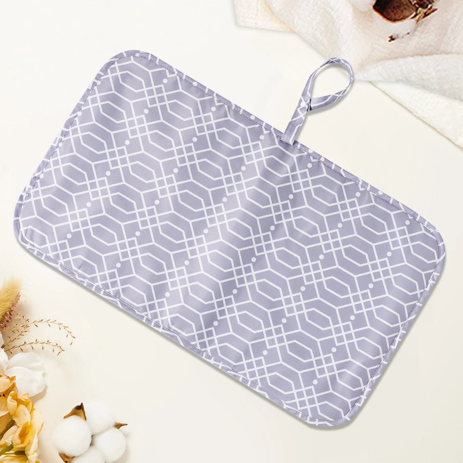 un-tapis-a-langer-pliable-portable