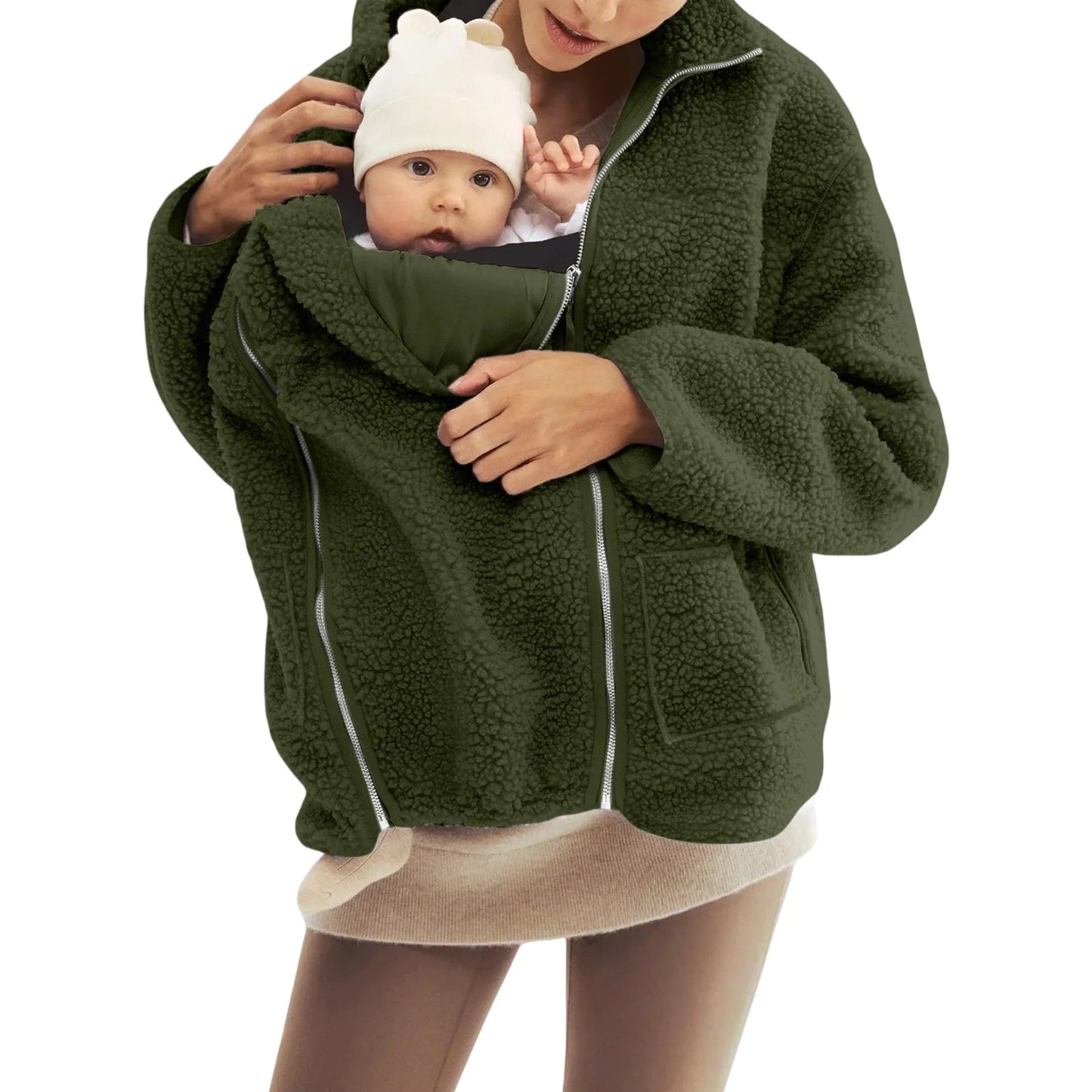 Veste de portage kaki qui accompagne bebe des premiers mois, la poche amovible se retire pour redonner une veste ordinaire.